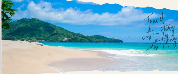 Tropical beach with turquoise water and green mountains